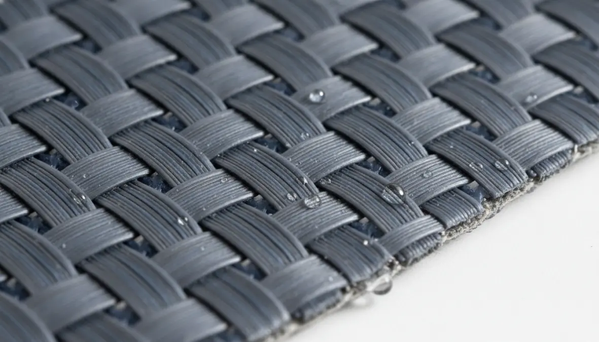 Dettaglio tessuto tecnico tappeto esterno resistente impermeabile con fibre sintetiche
